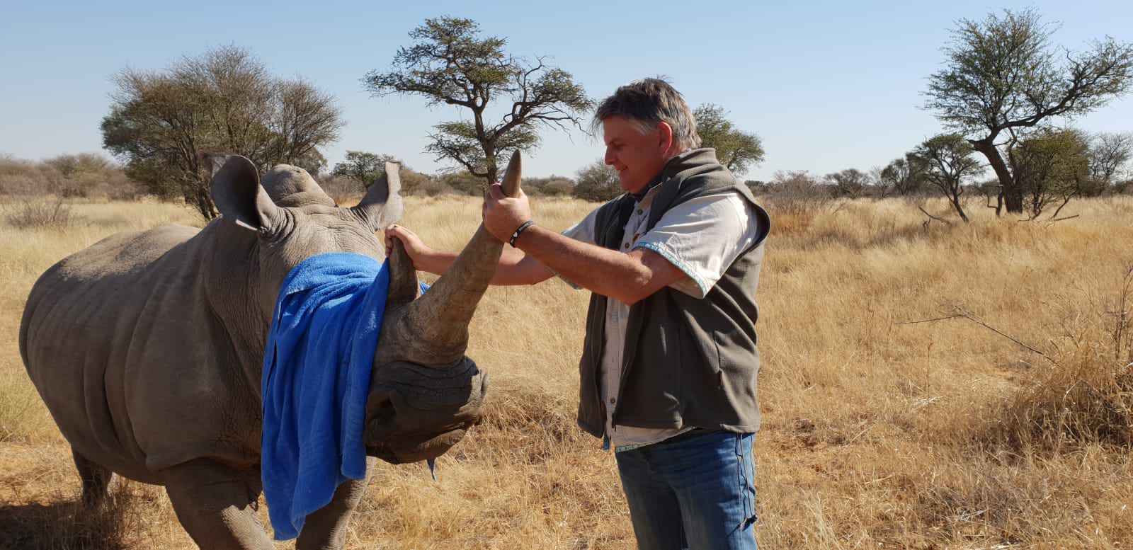 Grant Fowlds with a rhino